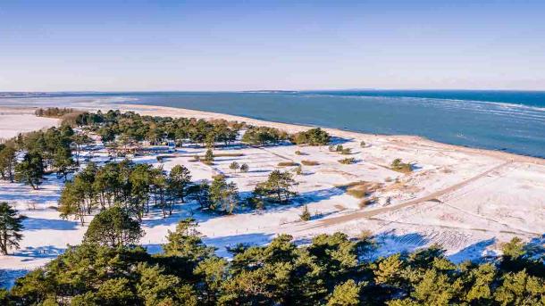 Flyvesandet wit a bit of snow in wintertime seen from the air