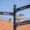 Signs in the street show the way to Bogense's attractions